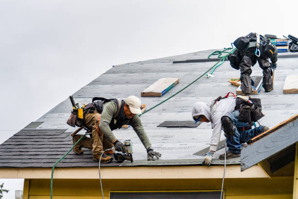 Professional Gutter Installation technician working in Enumclaw, WA